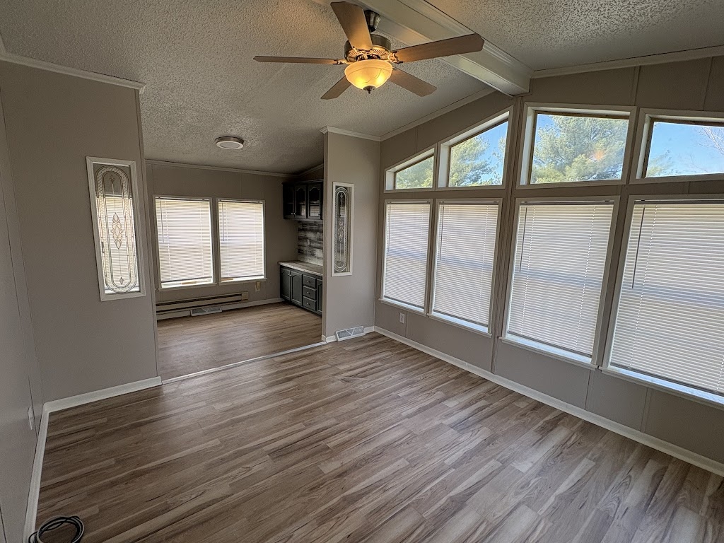 Living room with new LVP flooring installed Iowa