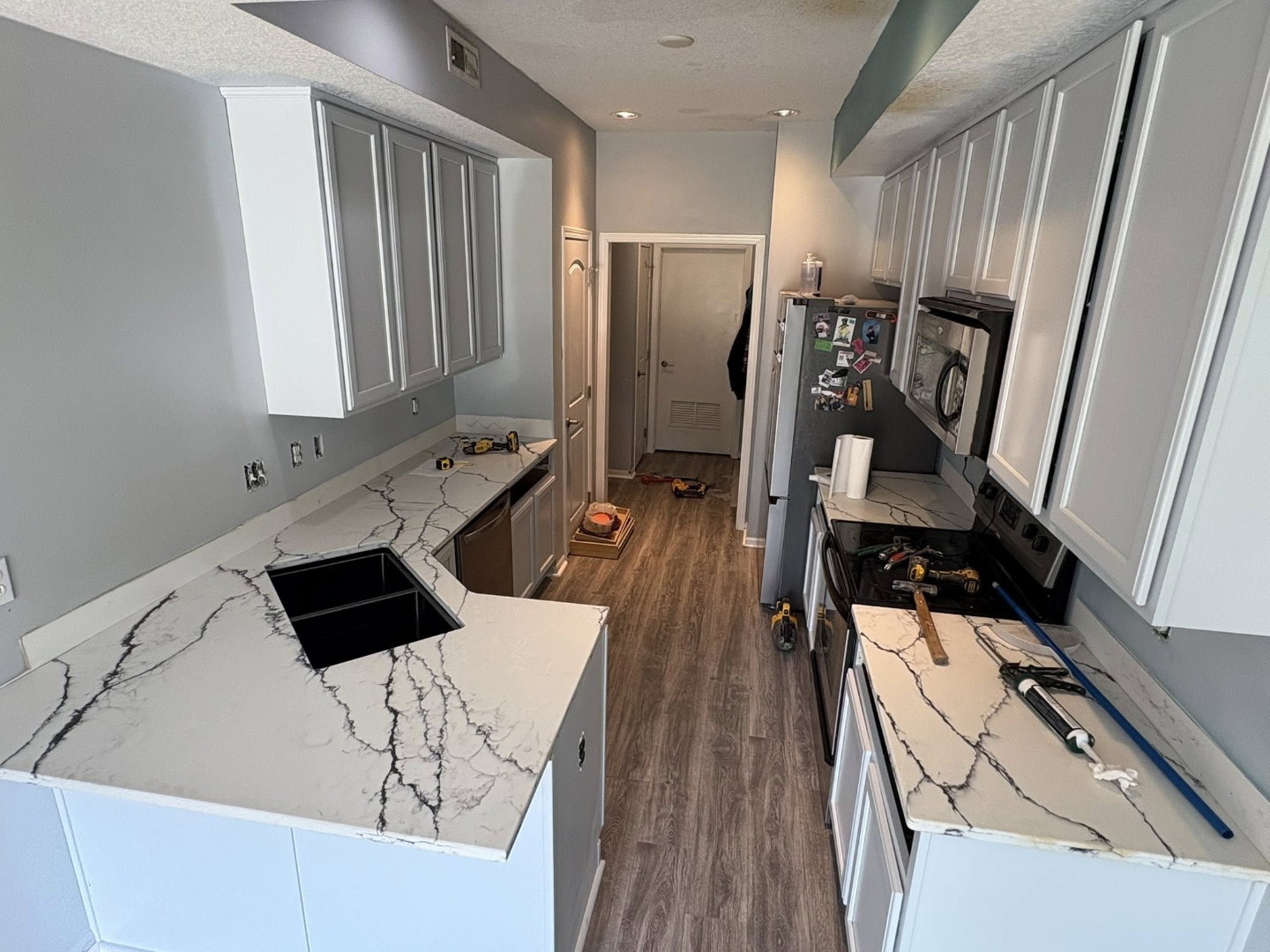 New white cabinets and quartz countertops kitchen Iowa