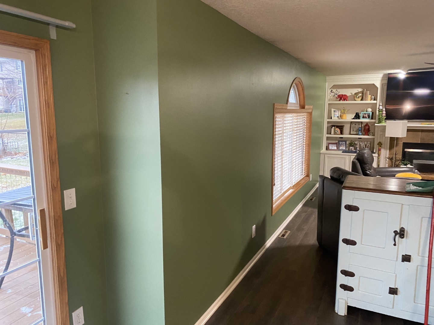 Living room with fresh green paint finish Iowa