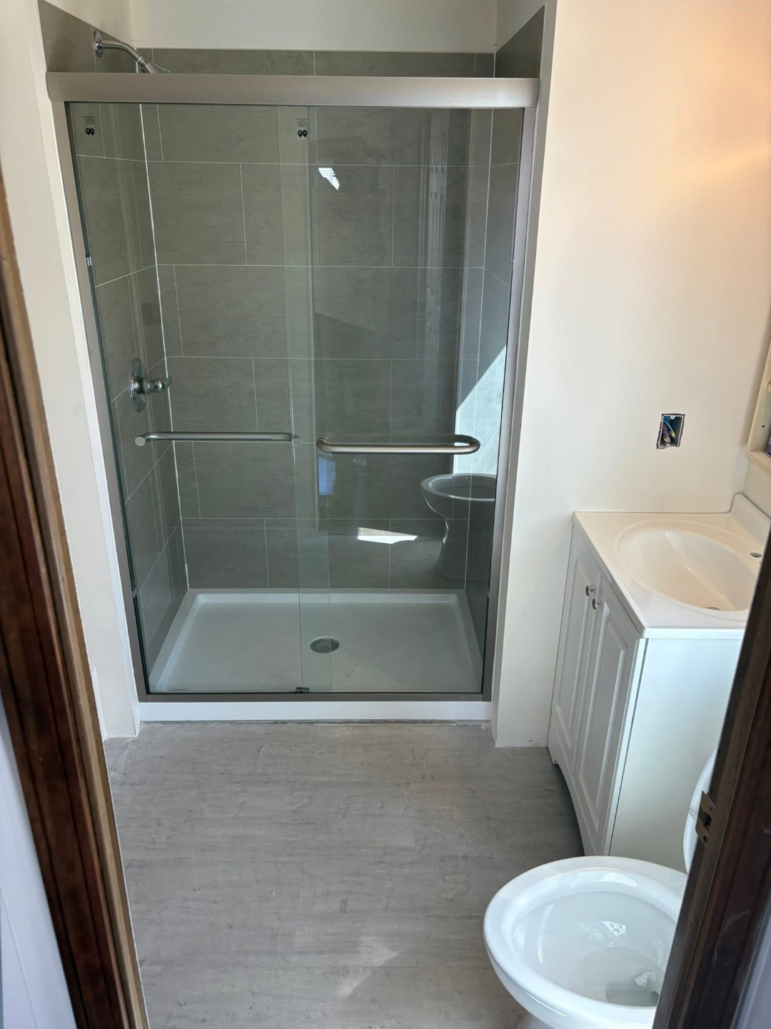 Luxury shower remodel marble tile Iowa