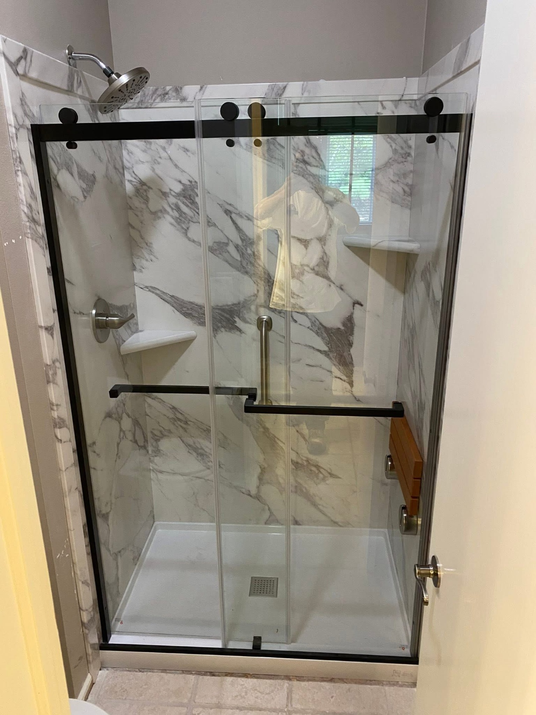 New glass shower enclosure bathroom remodel Iowa